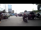 Cycling Jakarta during rush hour.