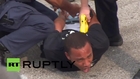 USA: Police wield taser against Freddie Gray protester as pre-trial kicks off for indicted cops