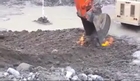 Contaminated Soil Ignites While Being Removed