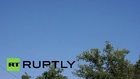 Ukraine: Watch plane getting hit and carry on flying over Slavyansk