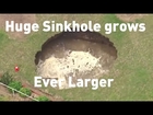 Huge sinkhole opens up in an Australian couple's back garden