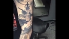 Guy shows off his Wehrmacht tattoo