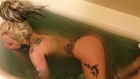 Lady Gaga lies naked in tub after being vomitted on