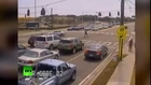 Surprising video Biker crashes into car, lands safely on feet