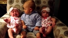 Adorably confused baby meets twins